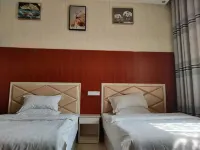 Ruxin Business Hotel (Chengwu Shengshi International Building Materials City)