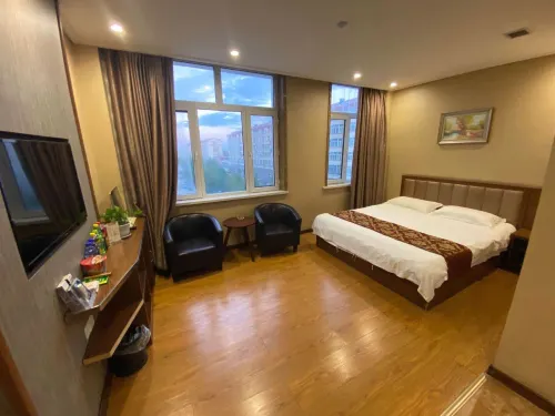 Qinggang Yixing Business Hotel - parcheggio