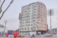 Yucheng Meigaomei Business Hotel (Yucheng New Bus Station) Hotel in zona Dancheng Museum