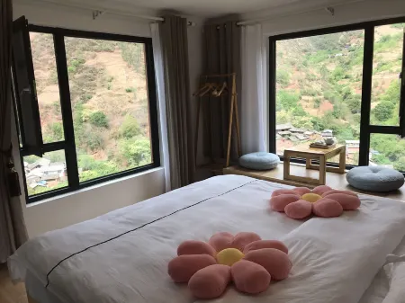 Guanjing Inn Nuodeng Ancient Village Отели в г. Юньлун