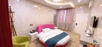 Xinmi Golden Triangle Business Hotel (Zhongqiang Light Year City Plaza)