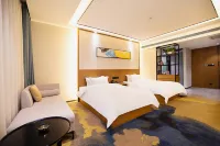 Wutong Hotel (Yingbin Road, Wanda Plaza, Huiji, Zhengzhou) Отели рядом с достопримечательностью «Преподавательский колледж Чжоу (Восточный Кампанский округ)»