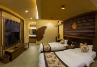 Fuchuan Thatched Cottage Resort