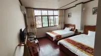 Jiuzhou Kelaixuan Inn Hotel in zona Maomaodong Ancient Human Relic Site