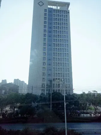 Shuanghua Express Hotel Отели рядом с достопримечательностью «Sand Wave Wonders Scenic Spot»