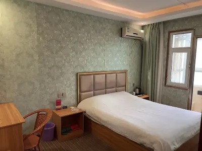 Xinxiang Sunshine Express Guestroom Отели рядом с достопримечательностью «Триколледж медицинской школы Синьцзяна»
