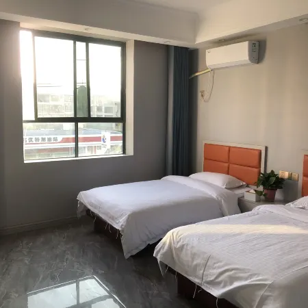 Wanzai Xinshi Hotel