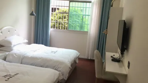 Baojing Wenfeng Business Hotel Hotels in Baojing County