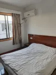 Huzhou Xingfu Home Hotel