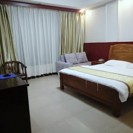 Yinjiang Mingcheng Business Hotel Отели рядом с достопримечательностью «Dasheng Dun Yingmei Lake Scenic Area»