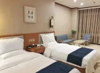 Tianyiyuan Business Hotel Hôtels à : Zhecheng