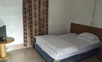Real Estate Guest House (Gaozhou Xiguan Road Shop)