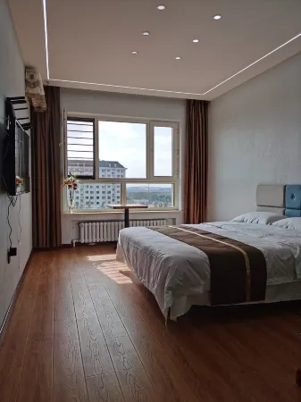 Yiju Apartment Отели рядом с достопримечательностью «Heilongjiang Oriental College»