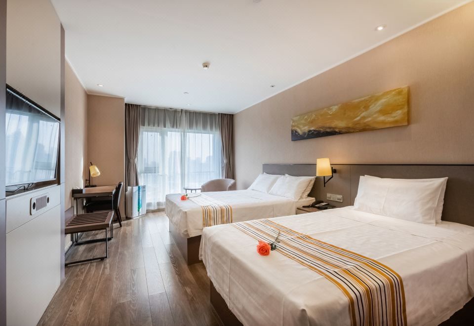 홈 인 플러스 호텔 객실 이미지