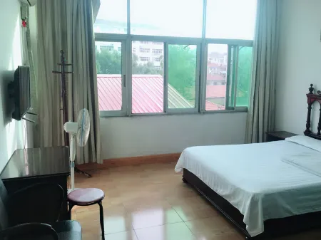 Jiahe Hostel Отели в г. Сяоган