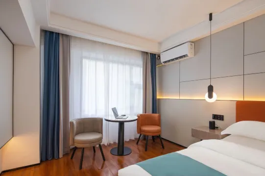 Liangzhi Huipin Hotel (Friendship Commercial Plaza Branch, Qilou Old Street, Haikou) Zimmer Photos