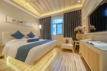 Fuyang Moli Luhua Business Hotel (Fuyang ecological paradise store) Отели рядом с достопримечательностью «Valley of Flowers Adventure Park»
