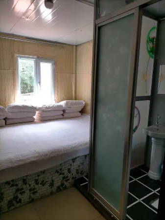 Changbaijiang Shangren Home Tucaiguan Отели рядом с достопримечательностью «Changbaishan No.1 Ice Spring»