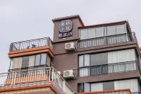 Meilin Xiaozhu Inn Hotel in zona Xingren Station