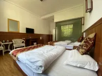 Weixi Taben Business Hotel Hotels in Weixi
