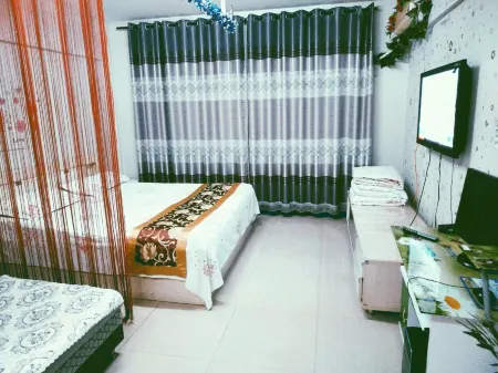 Daqing Rainbow Rile Apartment Отели рядом с достопримечательностью «Daqing Oilfield Paradise»