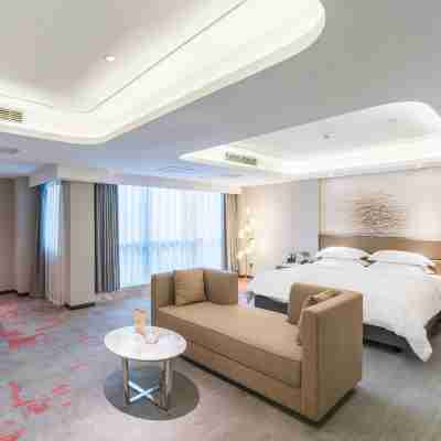 萬頤大酒店(欽州東站長融世貿廣場店) Rooms