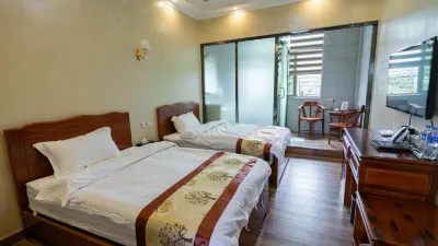 Silver Bay Hotel Apartment Hotel dekat Fudu Hot Spring Holiday Resort