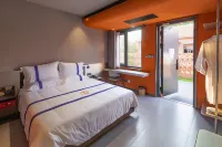 Rizhao Shangshuishanye1977 Art Hotel Отели в г. Ричжао