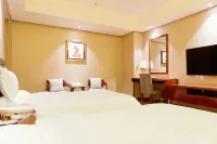 Xinda Hotel Hotel dekat Yueying Quanlong