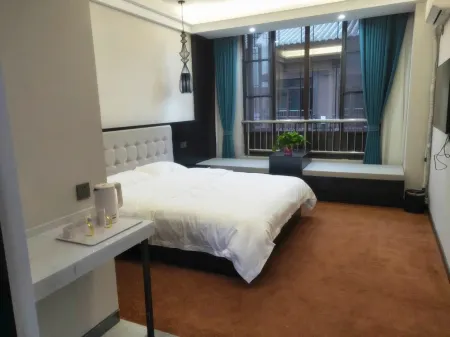 Xiuwu Ailü Boutique Homestay Отели в г. Сюу