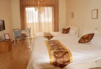 Yuzhong Aishu Hotel Hotel in zona Center Square