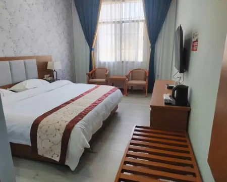 Linfeng Hotel Hoteles en Huize