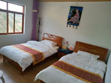 Nuodeng Ling'erling Hostel Отели в г. Юньлун