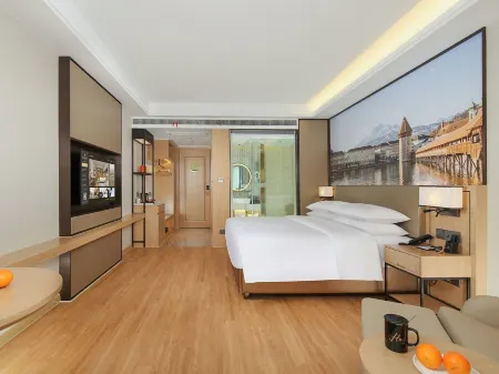 Vienna International Hotel (Hefei Changfeng Wanda store in Beicheng) Отели рядом с достопримечательностью «Anhui Business and Technology College»