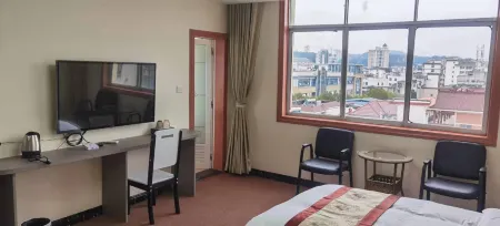 Mingzhu Business Hotel (Jianshe 2nd Road Shop) Отели рядом с достопримечательностью «Tianmu Yangming Dream Water World»