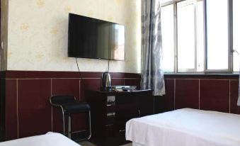 Ejina Xinfei Hotel