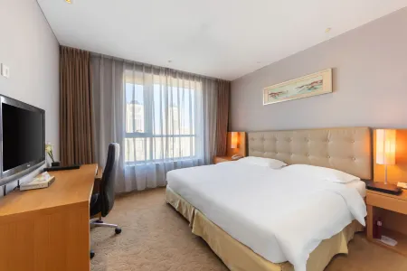 Qiangang Hotel Отели в г. Цянань