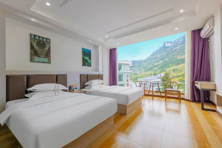 Xinhan Hotel Отели рядом с достопримечательностью «Seven Star village Scenic Area»