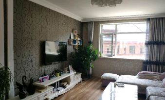 Benxi Huamu Hefu Warm Apartment