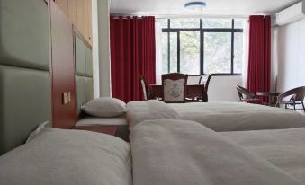 Yinjiang Muhuangyuquan Business Hotel