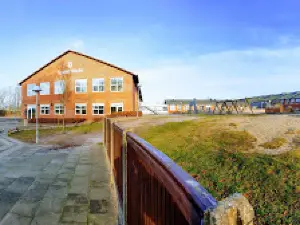 Spjald Fritidscenter