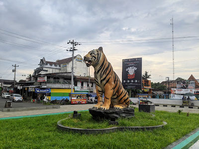 TUGU MACAN SIMO