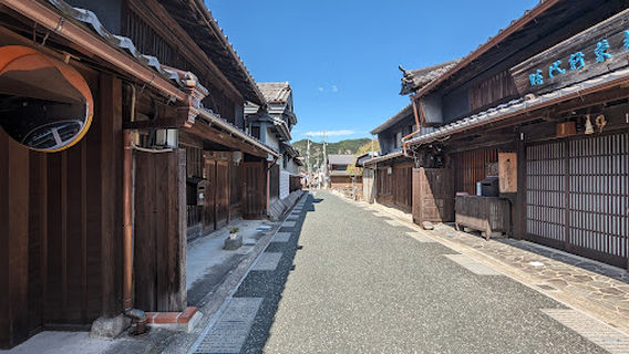 A townscape with rising udatsu trees