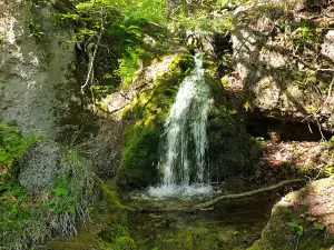 Waterfall and a cave "Futula"