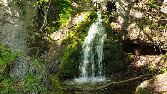 Waterfall and a cave "Futula"