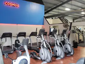 Cosmos Fitness & Tanning. Open 24 Hrs.