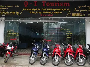 Q_T Tourism