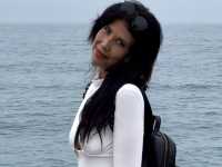 Dr Carla M