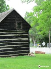 Mayhew Cabin with John Brown's Cave