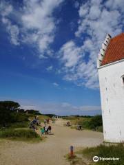 The sand-covered church
